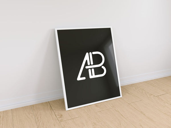 Free Poster Frame Against Wall Mockup