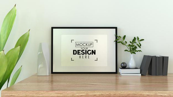 Free Poster Frame Mockup On The Wall With Plant Psd