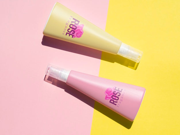 Free Product Design With Pink Bottles Mock-Up On Bicolor Background Psd