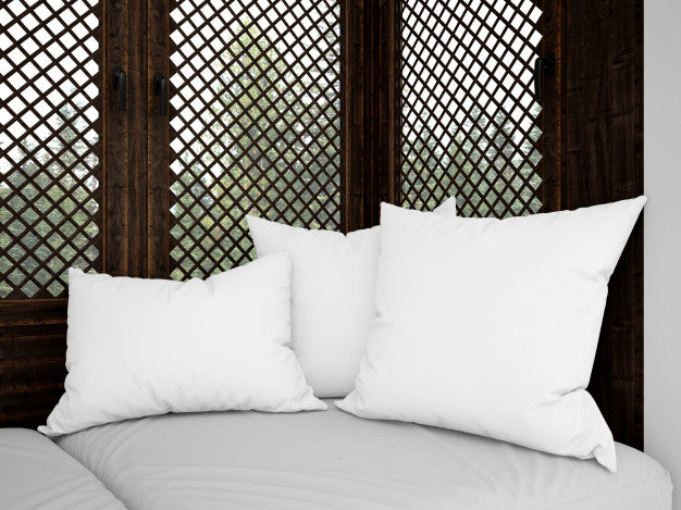 Free Realistic White Cushions On A Rustic Sofa Psd