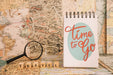 Free Retro Travel Concept Mockup With Notepad And Magnifying Glass Psd
