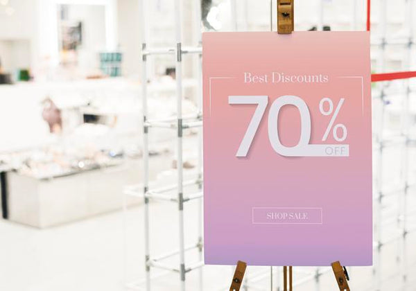 Free Sale Poster Mockup Near Shop Entrance Psd