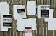 Free Sheets Of Paper Ads On A Wooden Fence Psd