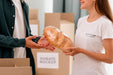 Free Side View Of Female Volunteer Handing Out Bread To Man Psd
