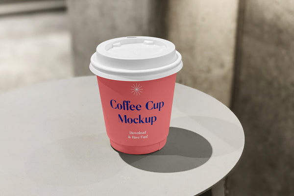 Free Small Coffee Cup On Table Mockup