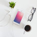 Free Smartphone Mockup With Charging Cable And Earphones Psd
