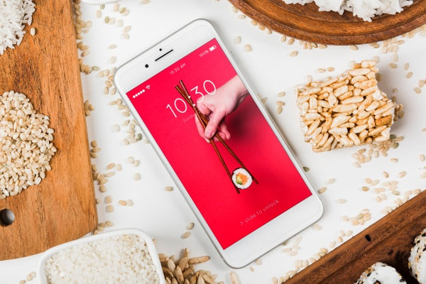 Free Smartphone Mockup With Japanese Food Mockup Psd