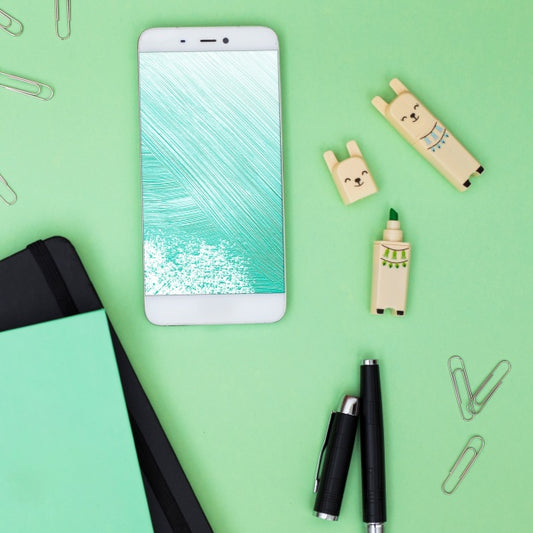 Free Smartphone Mockup With Office Elements Psd