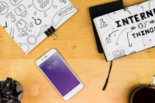 Free Smartphone Mockup With Office Materials On Table Psd