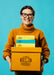 Free Smiley Woman Holding Boxes Psd