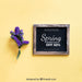 Free Spring Mock Up With Slate Next To Purple Flower Psd
