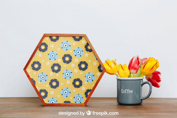 Free Spring Mockup With Hexagonal Frame Next To Cup Psd