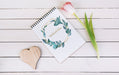 Free Spring Notebook Mockup With Decorative Plant In Top View Psd