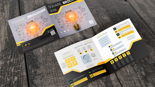 Free Square Brochure Mockup On Wooden Surface Psd