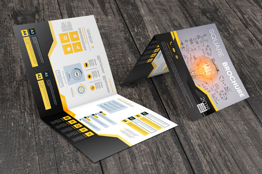 Free Square Brochure Mockup On Wooden Surface Psd