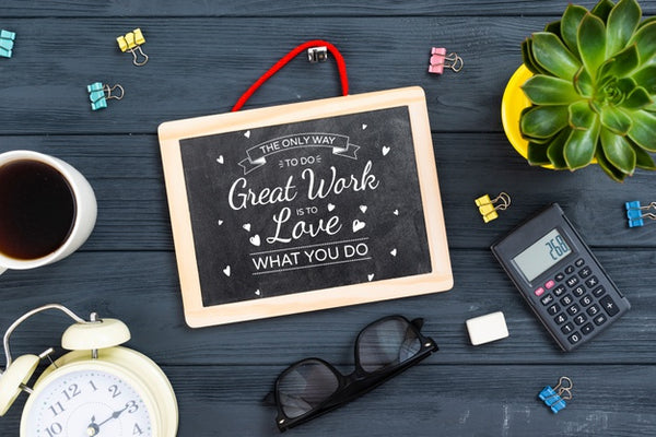 Free Stationery And Chalkboard In Workspace Psd