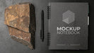 Free Stationery Mock-Up On Dark Concrete With Rugged Rock Psd
