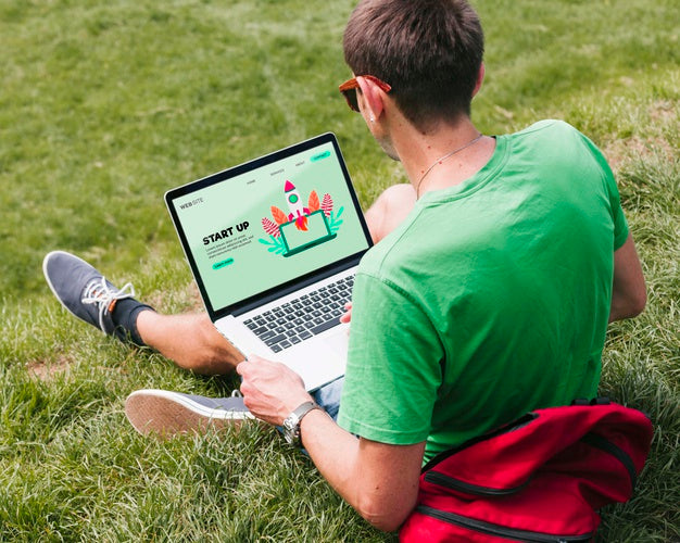 Free Student Working On Laptop Outdoors Psd