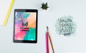 Free Tablet On Desk With Tools Psd