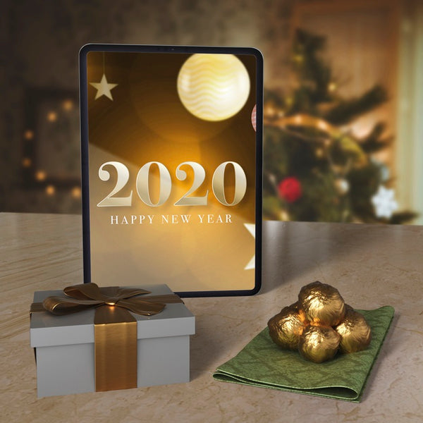 Free Tablet With New Year Wish Message On Table Psd