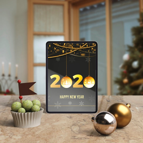 Free Tablet With New Year Wish On Table Psd