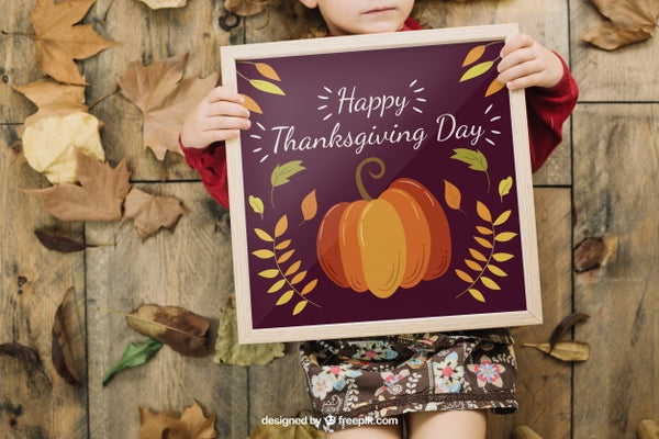 Free Thanksgiving Mockup With Girl Holding Frame Psd