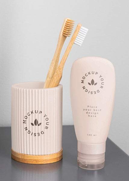 Free Toothbrushes In Cup And Cream Container Psd