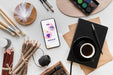 Free Top View Acrylic Palette And Brushes Beside Cup Of Coffee Psd