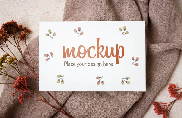 Free Top View Autumn Mock-Up With Flowers  On Grey Cloth Psd