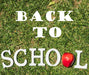 Free Top View Back To School Message On Grass Psd