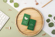 Free Top View Business Cards On Wood With Leaves Psd