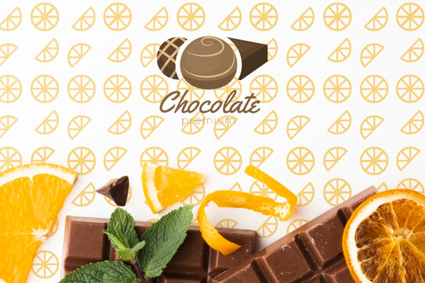 Free Top View Chocolate With Orange Wallpaper Mock-Up Psd