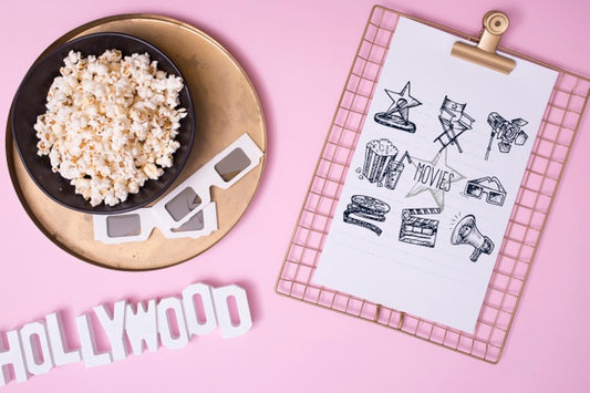 Free Top View Cinema Assortment On Pink Background Psd