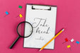 Free Top View Clipboard And Magnifying Glass Psd