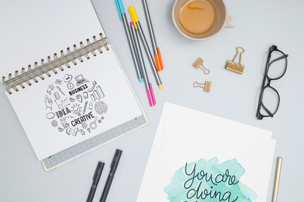 Free Top View Colorful Pens With Coffee Psd
