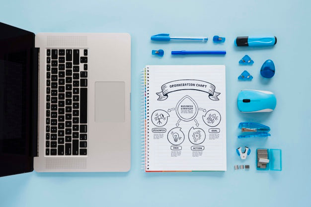 Free Top View Desk Concept With Laptop Psd – DreamBundles
