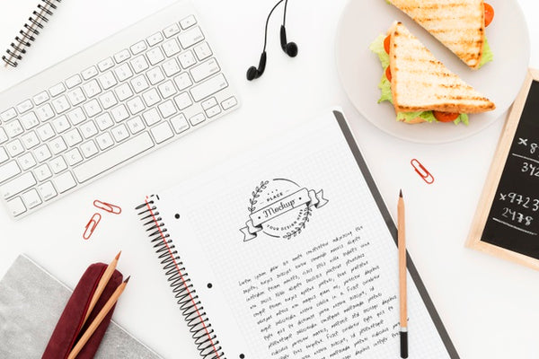 Free Top View Desk With Sandwich And Notebook Mock-Up Psd