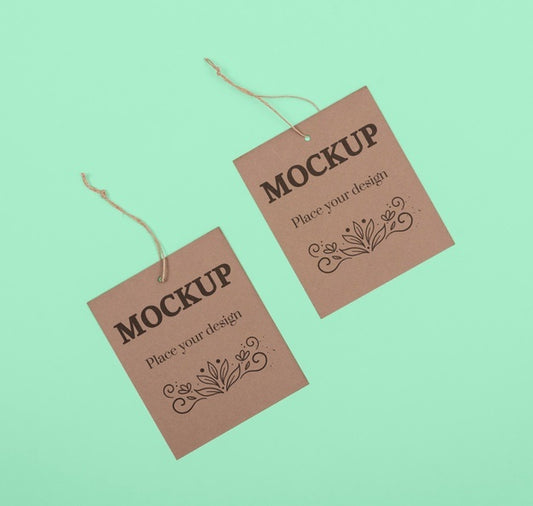 Free Top View Eco Tags On Green Background Psd