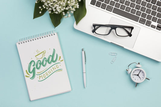 Free Top View Eyeglasses On Top Of Laptop Psd