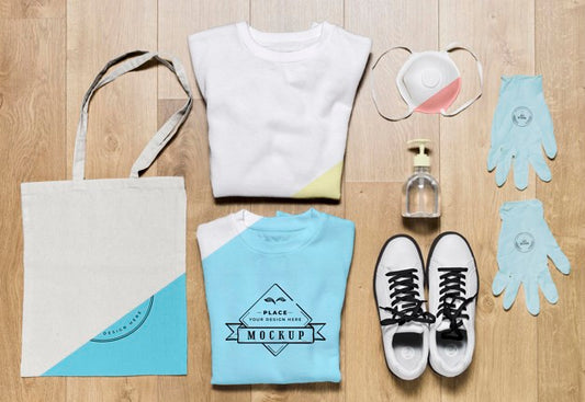 Free Top View Folded Hoodies Mock-Up With Bag And Shoes Psd