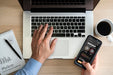Free Top View Man Using Laptop And Phone Mock-Up Psd