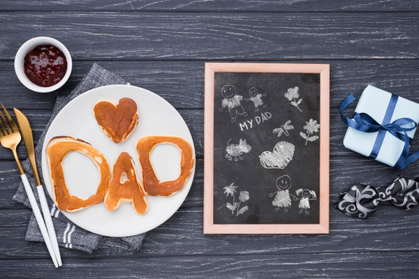 Free Top View Of Blackboard With Pancakes And Muffin For Fathers Day Psd