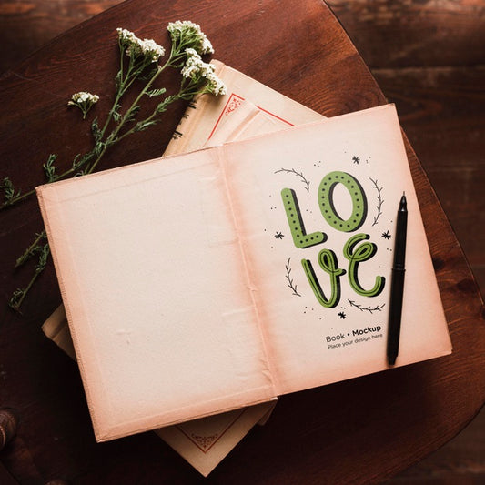 Free Top View Of Books With Flowers And Pen Psd