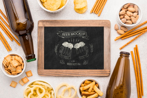 Free Top View Of Chalkboard With Beer Bottles And Assortment Of Snacks Psd