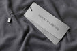 Free Top View Of Clothing Label On Black Fabric Psd