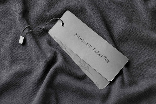 Free Top View Of Clothing Label On Black Fabric Psd