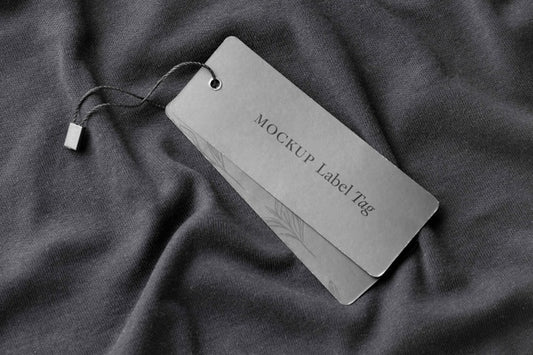 Free Top View Of Clothing Label On Black Fabric Psd