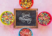 Free Top View Of Colorful Cereals And Chalkboard On Plain Background Psd