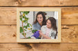 Free Top View Of Frame On Wooden Background Psd