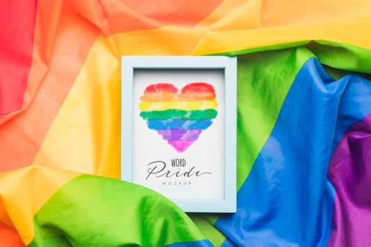 Free Top View Of Frame With Rainbow Colored Fabric Psd
